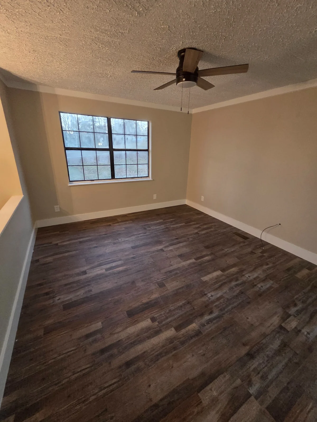 Finished painted room with trim installed by JM Precision