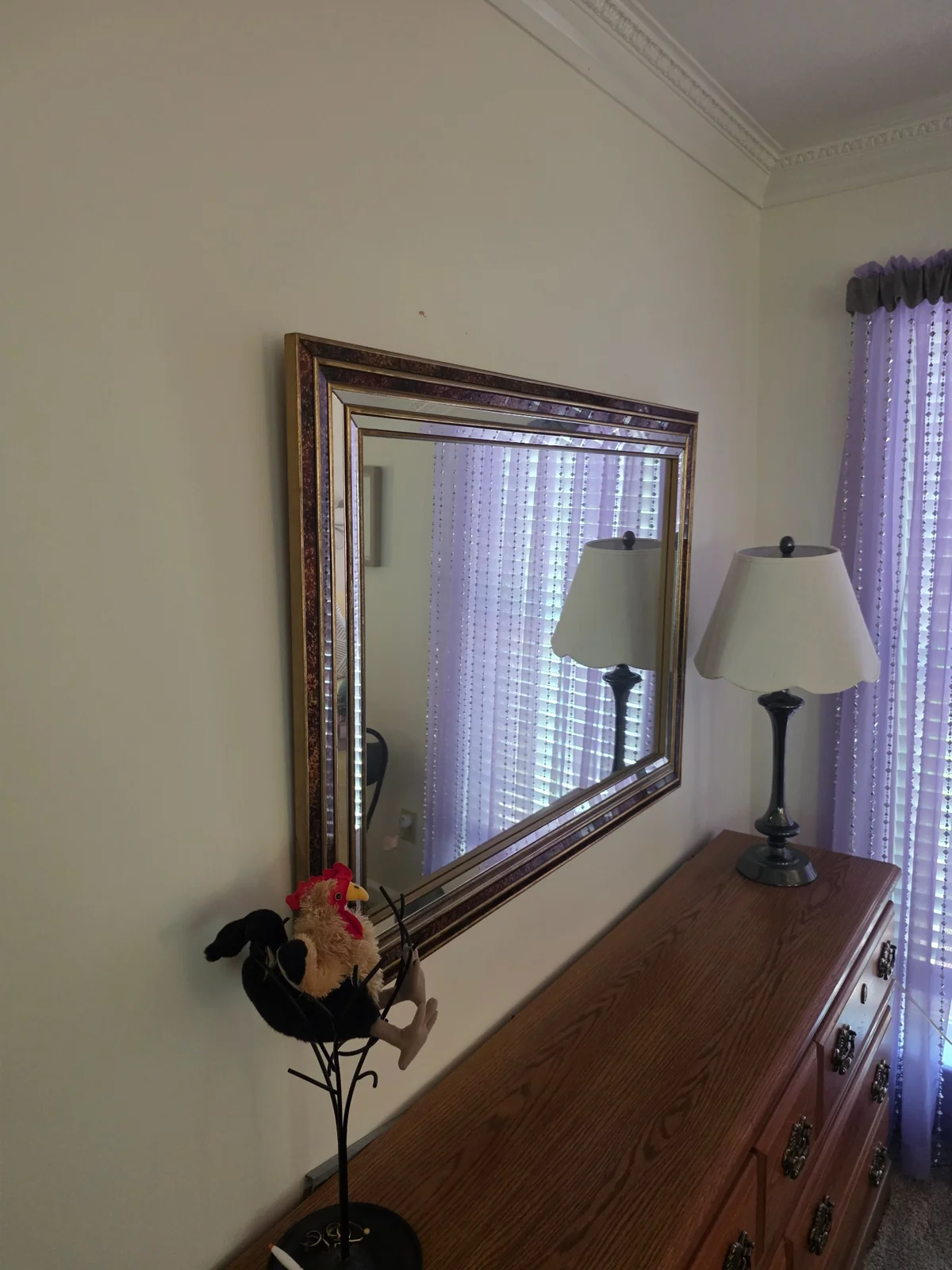 Decorative mirror mounted on an interior wall