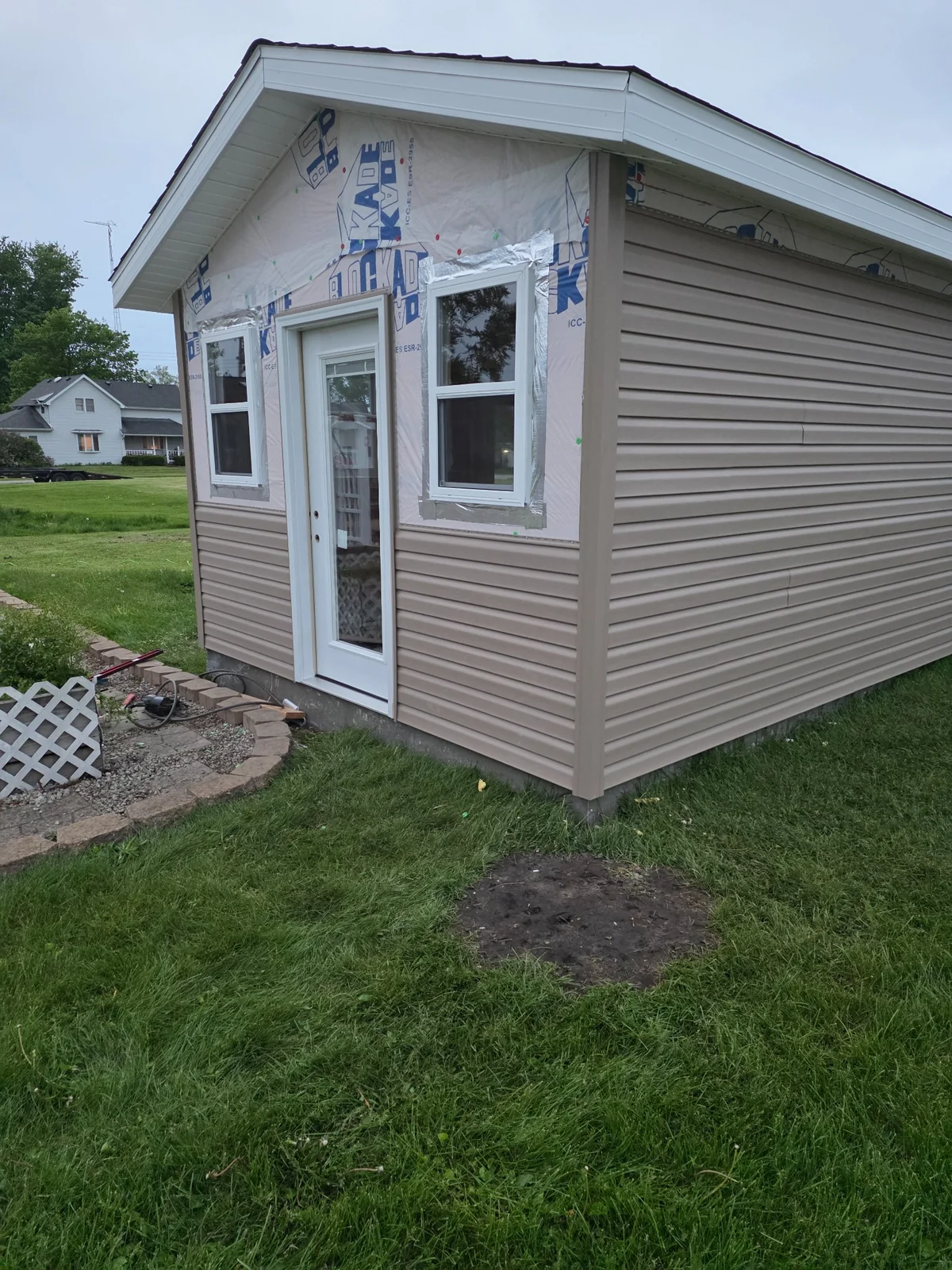 Exterior siding and window trim during installation
